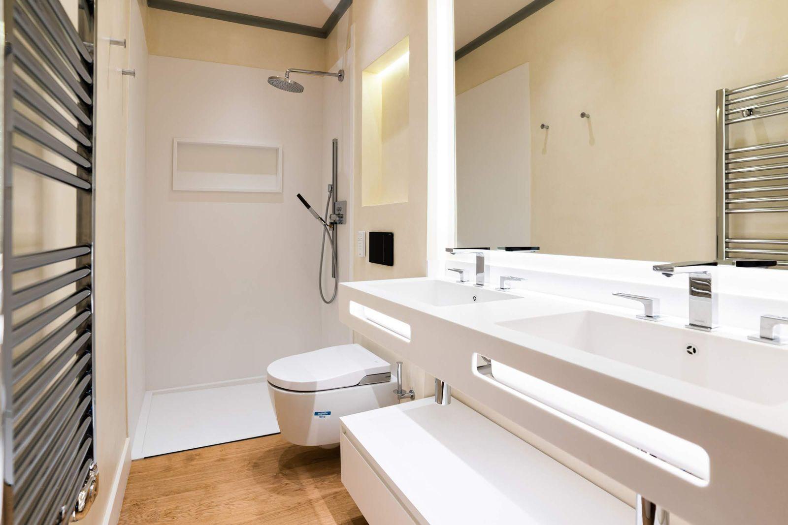 Bathroom with double vanity and rain shower